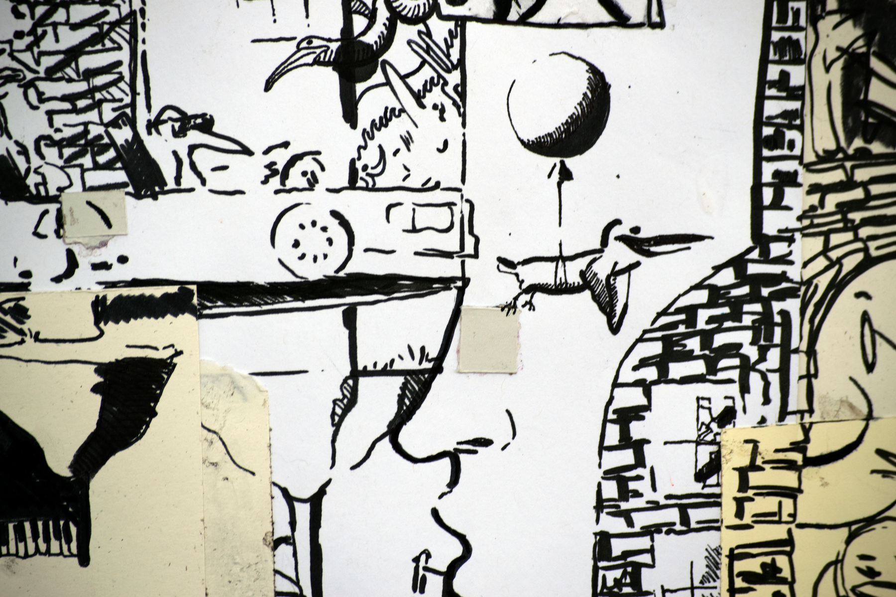 Detail from the image which depicts a bird and a balloon and lots of lines that are hard to understand. They read kind of like marks on a page more than drawings of anything in particular when you are this zoomed in